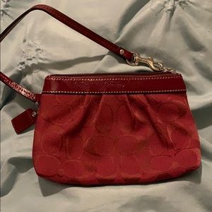 Burgundy coach wristlet